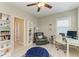 This office space has a work desk, a leather recliner, and built in shelving and storage at 5709 Sunflower Cir, Sarasota, FL 34238
