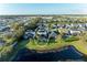 Beautiful home featuring a screened-in pool and a scenic pond view at 5709 Sunflower Cir, Sarasota, FL 34238