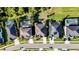 An aerial view of modern homes with screened-in pools, solar panels and professionally landscaped yards at 5746 Hydrangea Cir, Sarasota, FL 34238