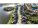 Community aerial view featuring luxury homes nestled alongside serene lakes and lush landscaping at 5746 Hydrangea Cir, Sarasota, FL 34238