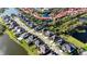 Scenic community aerial showcasing homes with water views, lush landscaping, and a tranquil atmosphere at 5746 Hydrangea Cir, Sarasota, FL 34238
