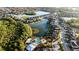 Panoramic aerial view of a vibrant community with lakes, lush landscaping, and resort-style amenities at 5746 Hydrangea Cir, Sarasota, FL 34238