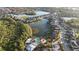 Panoramic aerial view of a vibrant community with lakes, lush landscaping, and resort-style amenities at 5746 Hydrangea Cir, Sarasota, FL 34238