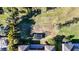 Birds eye view of the backyard featuring well-maintained lawn with large trampoline at 5746 Hydrangea Cir, Sarasota, FL 34238