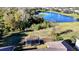 Aerial view of backyard featuring a private, well-maintained lawn with large trampoline at 5746 Hydrangea Cir, Sarasota, FL 34238
