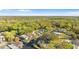 An elevated view showing waterfront community homes bordered by green space, offering a tranquil setting with a property pin at 6201 Waverly Rd, Weeki Wachee, FL 34607