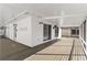 Large, covered porch featuring lighting, fan, seating area, and ample outdoor living space at 6201 Waverly Rd, Weeki Wachee, FL 34607