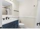 Bathroom featuring a stylish vanity with sleek fixtures and a shower with modern tile surround at 6201 Waverly Rd, Weeki Wachee, FL 34607