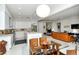 Spacious open-concept layout seamlessly connects kitchen, dining, and living areas for modern living at 7744 Sandhill Lake Dr, Sarasota, FL 34241