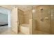 Bathroom boasts a soaking tub with tiled surround and glass-enclosed shower, creating a spa-like retreat at 800 N Tamiami Trl # 1506, Sarasota, FL 34236