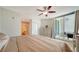 Spacious bedroom with private access to a lovely outdoor balcony at 800 N Tamiami Trl # 1506, Sarasota, FL 34236