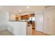 Well-lit kitchen with stainless steel appliances and granite countertops at 800 N Tamiami Trl # 1506, Sarasota, FL 34236