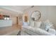 Stylish living room with tile floors, a comfortable couch, and abundant natural light at 800 N Tamiami Trl # 1506, Sarasota, FL 34236