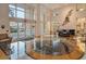 Spacious lobby with high ceilings, marble floors, comfortable seating, and abundant natural light at 800 N Tamiami Trl # 1506, Sarasota, FL 34236