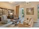 Cozy lounge with comfortable seating, bookshelves, and elegant decor for relaxation and reading at 800 N Tamiami Trl # 1506, Sarasota, FL 34236
