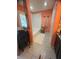 Inviting bathroom features a bathtub and tile flooring at 810 Hammockwood Ct, Sarasota, FL 34232