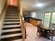 Eat-in kitchen area features stainless steel appliances and wooden cabinetry at 810 Hammockwood Ct, Sarasota, FL 34232