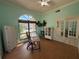 Bright home office featuring large windows and a functional workspace at 810 Hammockwood Ct, Sarasota, FL 34232