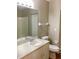 Standard bathroom featuring a vanity, toilet, and shower/tub combo at 8314 Drolet Ave, North Port, FL 34291