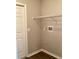 Laundry room with storage shelf and washer/dryer hookups at 8314 Drolet Ave, North Port, FL 34291