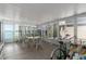Bright sunroom with tile flooring, large windows, and a view of the water at 8409 Imperial Cir, Palmetto, FL 34221