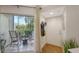 Entrance area with a view to the patio and the lush greenery surrounding it at 850 S Tamiami Trl # 307, Sarasota, FL 34236