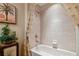 Bathroom featuring a shower-tub combo with a white tub and shower curtain at 9441 Discovery Ter # 101A, Bradenton, FL 34212