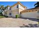 Attractive two-story home with a three-car garage and brick driveway at 9441 Discovery Ter # 101A, Bradenton, FL 34212