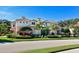 Stunning two-story home with lush landscaping, creating an inviting and picturesque curb appeal at 9441 Discovery Ter # 101A, Bradenton, FL 34212