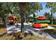 Colorful kayaks are neatly stacked outdoors, offering residents a delightful waterside recreational experience at 9441 Discovery Ter # 101A, Bradenton, FL 34212