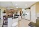 Bright kitchen features granite counters, white cabinets, and an island with seating at 9441 Discovery Ter # 101A, Bradenton, FL 34212