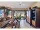Bright and airy living room with large windows offering scenic views, comfortable seating, and stylish furnishings at 9441 Discovery Ter # 101A, Bradenton, FL 34212