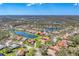 A sprawling residential neighborhood featuring mature trees, scenic ponds, and well-manicured lawns at 9612 Old Hyde Park Pl, Bradenton, FL 34202