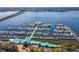 Fantastic overhead shot showcasing marina with multiple boats docked along the scenic waterfront at 1000 Riverside Dr # B102, Palmetto, FL 34221