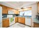 Well-equipped kitchen with modern appliances, a functional layout, and natural light at 1000 Riverside Dr # B102, Palmetto, FL 34221