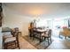 Open concept living and dining space featuring a breakfast bar and stylish decor at 1000 Riverside Dr # B102, Palmetto, FL 34221
