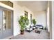 Inviting outdoor seating area with comfortable furniture and potted plants, perfect for relaxing at 11511 Harbourside Ln, Parrish, FL 34219