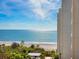 Balcony offers stunning ocean views, with clear skies and lush landscape below at 1211 Gulf Of Mexico Dr # 702, Longboat Key, FL 34228