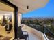 Relax on this tiled balcony with glass railings and expansive views of the city and ocean at 1211 Gulf Of Mexico Dr # 702, Longboat Key, FL 34228