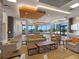 This spacious resident common area has stylish decor and ocean views at 1211 Gulf Of Mexico Dr # 702, Longboat Key, FL 34228