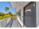 Welcome home! Beautiful entryway with a welcome sign and serene views at 123 Hammock Rd, Anna Maria, FL 34216