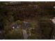 Aerial view of a home surrounded by dense trees and nature, creating a private retreat at 13608 11Th E Ter, Bradenton, FL 34212