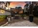 Outdoor patio with dining table, pergola and beautiful landscaping, perfect for entertaining at 13608 11Th E Ter, Bradenton, FL 34212
