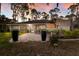 Beautiful backyard featuring a patio, screened porch, lush landscaping and privacy at 13608 11Th E Ter, Bradenton, FL 34212