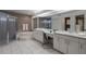 Bathroom with a large vanity, bathtub, and a separate glass shower at 13608 11Th E Ter, Bradenton, FL 34212