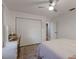 Bedroom with a double closet, ceiling fan, vanity, and natural light at 13608 11Th E Ter, Bradenton, FL 34212