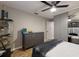 Bedroom showcasing neutral walls, wood flooring, and closet with mirrored doors at 13608 11Th E Ter, Bradenton, FL 34212