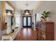 Bright foyer features wood floors, stylish lighting, and an open floor plan at 13608 11Th E Ter, Bradenton, FL 34212