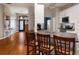 Bright kitchen with bar seating, opening to living spaces and entryway at 13608 11Th E Ter, Bradenton, FL 34212
