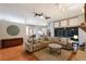 Spacious living room with hardwood floors, ample seating, and access to the outdoors at 13608 11Th E Ter, Bradenton, FL 34212